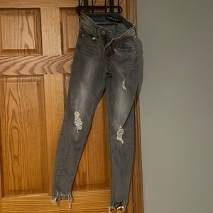 Express mid-rise gray skinny jeans with frayed hem